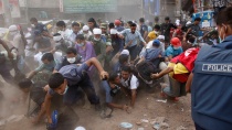 Под каменными завалами бангладешской фабрики погребена тысяча человек.аварии, Бангладеш, обрушение, фабрика.НТВ.Ru: новости, видео, программы телеканала НТВ