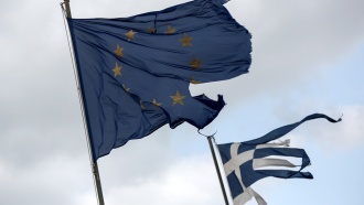 Греция получит первую часть помощи к 17 августа