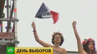 Активистки FEMEN устроили голый протест против Марин Ле Пен