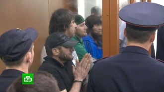 Осужденные за убийство Немцова улыбались и показывали знак победы