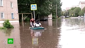 Жители Воронежской области пересели на лодки из-за мощного ливня