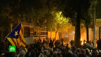 На акции в Барселоне радикалы переворачивали и поджигали мусорные баки