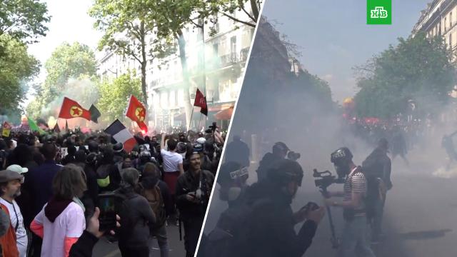 Полиция Парижа применила слезоточивый газ против радикалов в ходе первомайской демонстрации.Париж, Франция, беспорядки, митинги и протесты, полиция.НТВ.Ru: новости, видео, программы телеканала НТВ