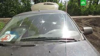 Машины волонтеров с гумпомощью попали под обстрел в ЛНР
