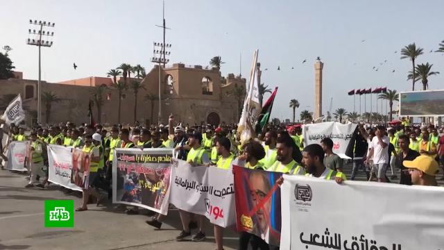 Ливию охватили массовые акции протеста против ухудшения условий жизни.Ливия, митинги и протесты.НТВ.Ru: новости, видео, программы телеканала НТВ