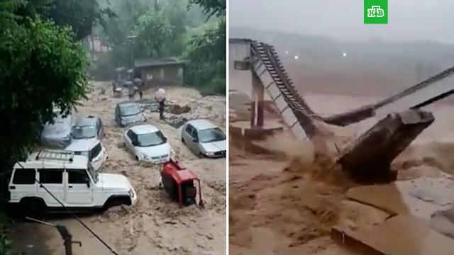 Наводнения и оползни в Индии унесли жизни 22 человек.Индия, оползни, погодные аномалии, стихийные бедствия.НТВ.Ru: новости, видео, программы телеканала НТВ